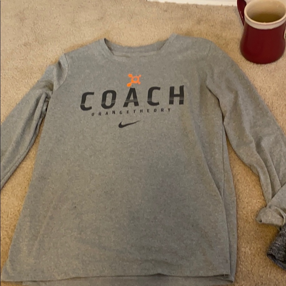 Orange Theory coach Nike dry-fit top